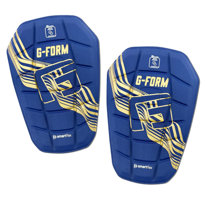 ESPINILLERAS PRO-S BLADE SHINGRD NOC-NAVY/GOLD/BLK