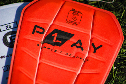 ESPINILLERAS PRO-S BLADE NOCSAE SHINGUARD P1AY NARANJA